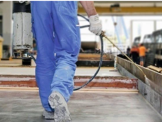 Chemical surface preparation on concrete floor